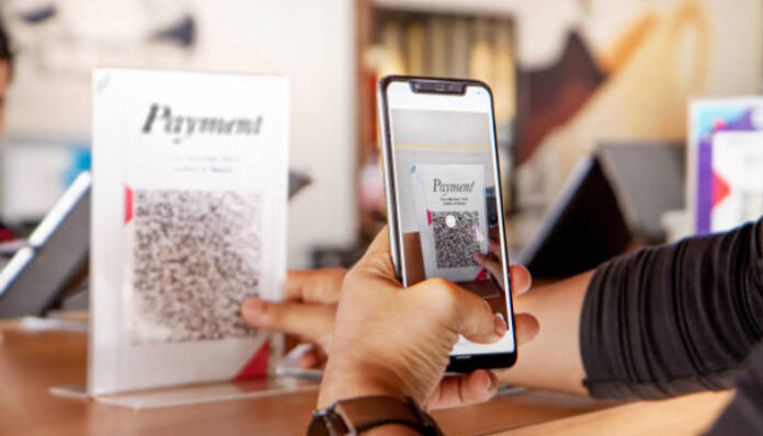 Ilustrasi pembayaran QRIS (Foto/iStockphoto)