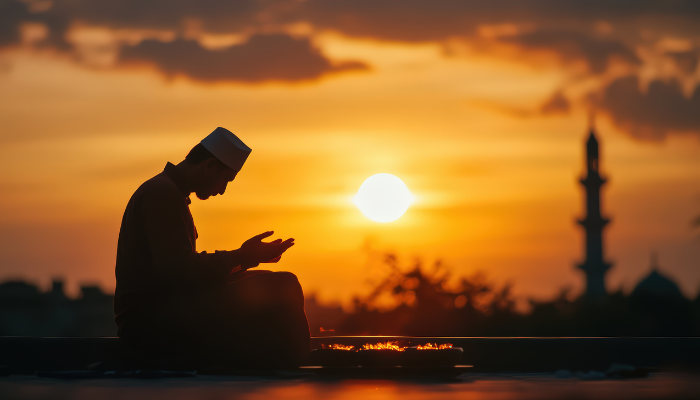 Jadwal salat. Ilustrasi seseorang sedang berdoa seusai salat (Magenta)