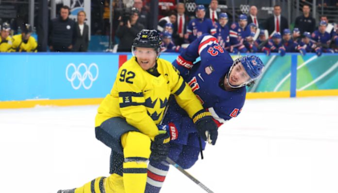 Gol Hughes Antar Amerika Serikat ke Semifinal Hoki Es Olimpiade 2026 (Foto oleh Bruce Bennett/Getty Images)