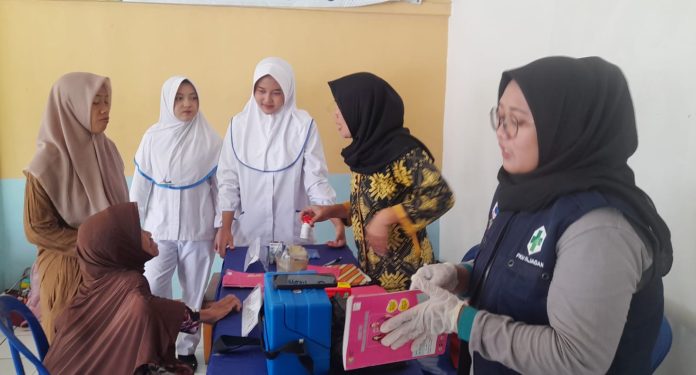 Posyandu Desa Pajagan mendukung Program CKG lewat pemeriksaan balita (Bantentv.com/ Nano)