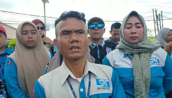 Ketua Dewan Pimpinan Cabang Serikat Pekerja Nasional (DPC SPN) Kabupaten Lebak, Sidik Uwen
