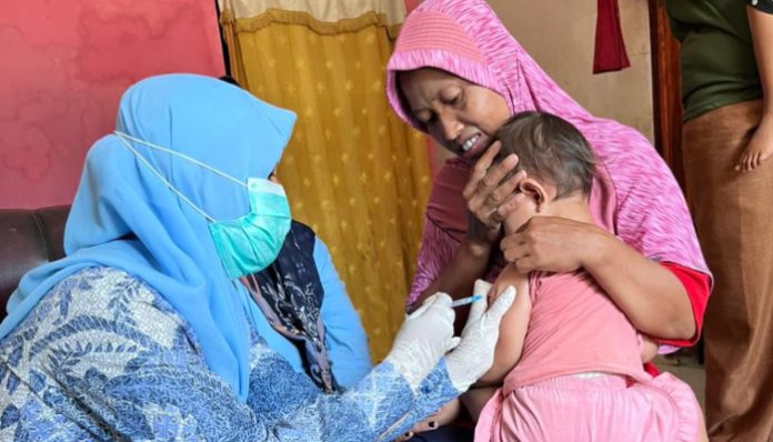 Kegiatan imunisasi campak di wilayah kerja Puskesmas Jawilan