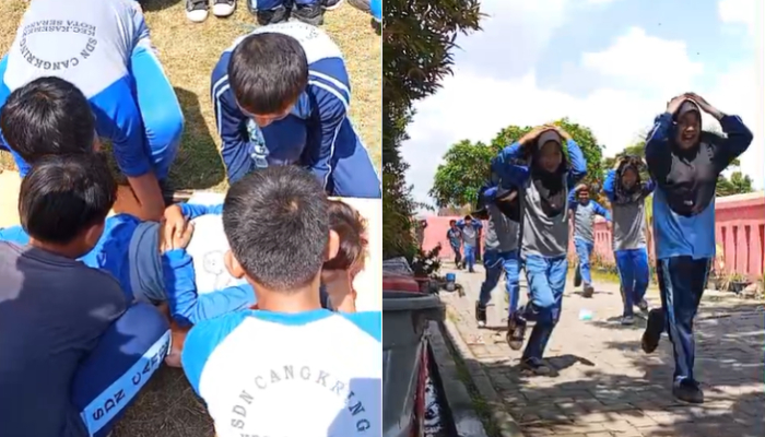 Siswa SD Negeri Cangkring mempraktikkan simulasi evakuasi gempa bumi saat kegiatan edukasi kebencanaan oleh BPBD Kota Serang