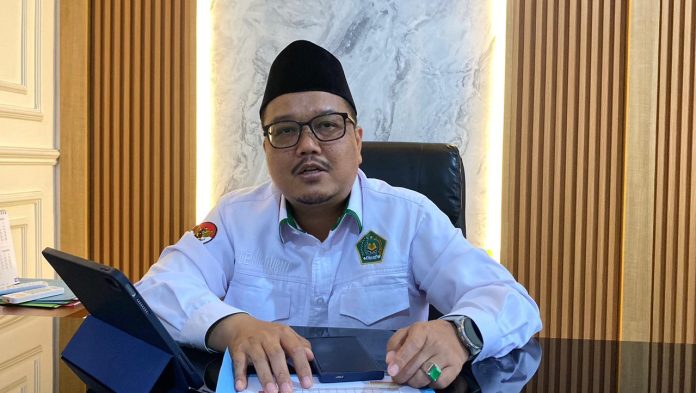 Kepala Kemenag Kabupaten Serang Uesul Qurni saat diwawancarai (Foto: Bantentv.com/ Riki)