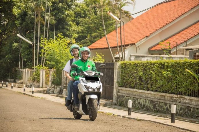 Ilustrasi pengguna GrabBike (Foto: Dok. Grab Indonesia)